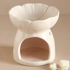 Premium white porcelain wax melt warmer with floral design, showcasing handcrafted flower bowl and arched tealight chamber, perfect for aromatherapy and home decor