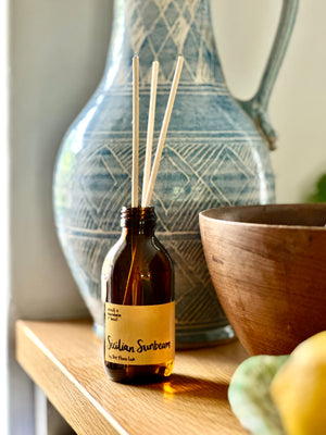 Sicilian Sunbeam Room Diffuser. SIcilian Sunbeam Italian Summer Candle. Great diffuser for Summer time. Really romantic frgarance with Neroli, Mandarin and Basil. Hand poured soy derived diffuser made of natural ingredients. Perfect for summer time scenting. Room filling diffuser with 6 natural rattan reeds and comes in a beautoful presentation box, which features wild flowers and animals on it. Cottage core in its sttyle, it is perfect for nature lovers. Yellow diffuser. 